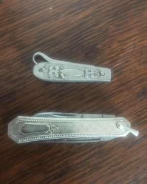 LADIES FINE BUTTON HOOK AND A SILVER MANICURE KNIFE