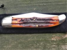 CANAL STREET ITEM #212309 HUGE 5 1/4 INCH FOLDING HUNTER DARK CARVED AMBER STAG BONE 420 STAINLESS CANAL STREET ITEM #212309 HUGE 5 1/4 INCH FOLDING HUNTER DARK CARVED AMBER STAG BONE 420 STAINLESS