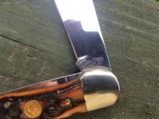 CANAL STREET ITEM #212309 HUGE 5 1/4 INCH FOLDING HUNTER DARK CARVED AMBER STAG BONE 420 STAINLESS CANAL STREET ITEM #212309 HUGE 5 1/4 INCH FOLDING HUNTER DARK CARVED AMBER STAG BONE 420 STAINLESS