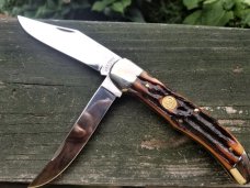 CANAL STREET ITEM #212309 HUGE 5 1/4 INCH FOLDING HUNTER DARK CARVED AMBER STAG BONE 420 STAINLESS CANAL STREET ITEM #212309 HUGE 5 1/4 INCH FOLDING HUNTER DARK CARVED AMBER STAG BONE 420 STAINLESS