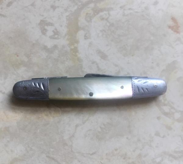 100 YEAR OLD STILL PERFECT PEARL AND ALUMINUM BOLSTERS