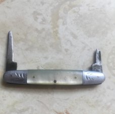 100 YEAR OLD STILL PERFECT PEARL AND ALUMINUM BOLSTERS