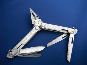 LEATHERMAN Free P4 Stainless Steel Multi-Tool, Pliers, Saw, Folding Knives  Plain & Serrated Blades