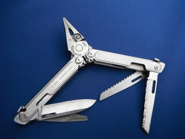 LEATHERMAN Free P4 Stainless Steel Multi-Tool, Pliers, Saw, Folding Knives  Plain & Serrated Blades