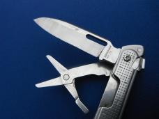 LEATHERMAN Free P4 Stainless Steel Multi-Tool, Pliers, Saw, Folding Knives  Plain & Serrated Blades