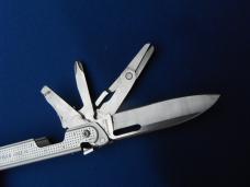 LEATHERMAN Free P4 Stainless Steel Multi-Tool, Pliers, Saw, Folding Knives  Plain & Serrated Blades
