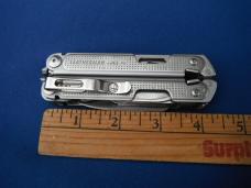 LEATHERMAN Free P4 Stainless Steel Multi-Tool, Pliers, Saw, Folding Knives  Plain & Serrated Blades