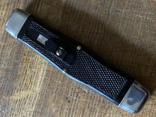 unusual swell center OUT THE FRONT OTF Automatic knife scarce fast shipping very nice unusual swell center OUT THE FRONT OTF Automatic knife scarce fast shipping very nice