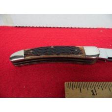 KABAR BONE JACK KNIFE WITH MAN FIGHTS BEAR SHIELD UNUSED VERY HARD TO FIND WJK - 91 KABAR BONE JACK KNIFE WITH MAN FIGHTS BEAR SHIELD UNUSED VERY HARD TO FIND WJK - 91