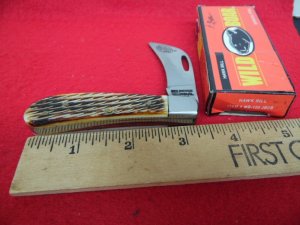 WILD BOAR CAMEL BONE HAWKBILL  NICE STORAGE FIND FROM A FEW YEARS BACK  UNUSED IN BOX STRONG SPRING