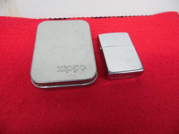 ZIPPO LIGHTER IN METAL TIN USED