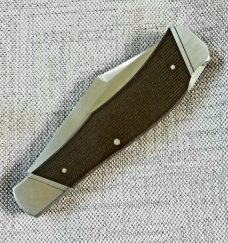 Keith Johnson Arkansas Hunter Lockback with cpm154 and OD Canvas Micarta at 4.5"..Integral & ringed Keith Johnson Arkansas Hunter Lockback with cpm154 and OD Canvas Micarta at 4.5"..Integral & ringed