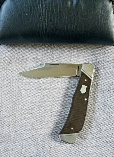 Keith Johnson Arkansas Hunter Lockback with cpm154 and OD Canvas Micarta at 4.5"..Integral & ringed Keith Johnson Arkansas Hunter Lockback with cpm154 and OD Canvas Micarta at 4.5"..Integral & ringed
