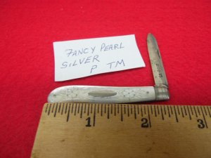 33 YR CLOSE OUT VINTAGE SLIGHTLY USED SINGLE SILVER BLADE  PEARL HANDLES LADIES OR FRUIT KNIFE MAYBE