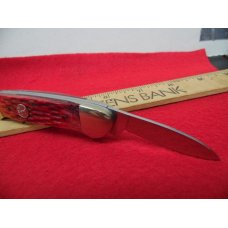 33 YR CLOSE OUT MAGNUM RED BONE 3-1/2" CANOE PRODUCT OF BOKER TREE BRAND UNUSED 33 YR CLOSE OUT MAGNUM RED BONE 3-1/2" CANOE PRODUCT OF BOKER TREE BRAND UNUSED