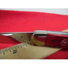33 YR CLOSE OUT MAGNUM RED BONE 3-1/2" CANOE PRODUCT OF BOKER TREE BRAND UNUSED 33 YR CLOSE OUT MAGNUM RED BONE 3-1/2" CANOE PRODUCT OF BOKER TREE BRAND UNUSED