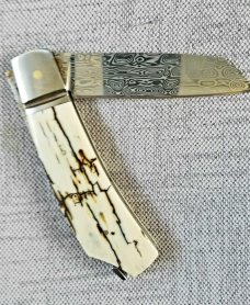 Steve Vanderkolff Native Taillock 4".. Mammoth and Polished Damasteel...Fluted Integral bolsters Steve Vanderkolff Native Taillock 4".. Mammoth and Polished Damasteel...Fluted Integral bolsters