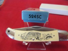 Schrade Scrimshaw Folding Hunter Model # 524SC Schrade Scrimshaw Folding Hunter Model # 524SC