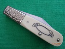 Schrade Scrimshaw SC-506 Barlow Racoon Schrade Scrimshaw SC-506 Barlow Racoon