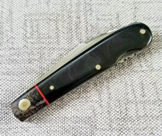K'roo Custom Swayback Lockback W/ slip, 4" closeD micarta, spacers and liners filework K'roo Custom Swayback Lockback W/ slip, 4" closeD micarta, spacers and liners filework