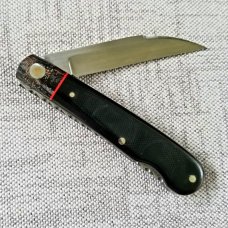 K'roo Custom Swayback Lockback W/ slip, 4" closeD micarta, spacers and liners filework K'roo Custom Swayback Lockback W/ slip, 4" closeD micarta, spacers and liners filework