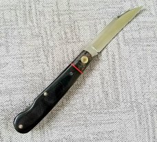 K'roo Custom Swayback Lockback W/ slip, 4" closeD micarta, spacers and liners filework K'roo Custom Swayback Lockback W/ slip, 4" closeD micarta, spacers and liners filework