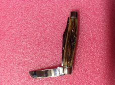 Schatt Morgan large 4 1/4  3 blade stockman. 2001  Carmel in color. New unused.