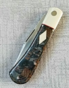 K'roo Custom Lanny clip,4" clsd Blanket micarta scales and.ivory micarta bolsters ..filework..Rwl34 K'roo Custom Lanny clip,4" clsd Blanket micarta scales and.ivory micarta bolsters ..filework..Rwl34