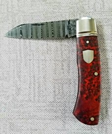 Pablo Castellani Native...Ladder Damascus and Amboyna Burl...4" ..integral fluted & doved bolsters Pablo Castellani Native...Ladder Damascus and Amboyna Burl...4" ..integral fluted & doved bolsters