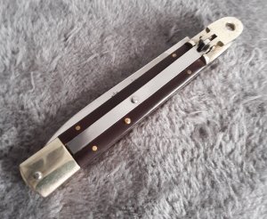 Vintage 1980 Hubertus W. Germany Micarta slimline 7 3/4"