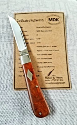Michael du Pleesis Swayback Knife,3.75"closed.. Camel Thorn Burl and N690,coa & slip,Bose design
