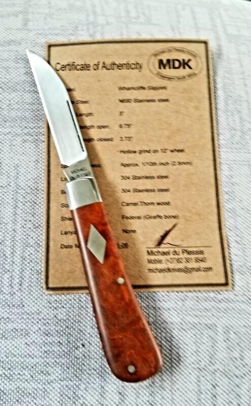 Michael du Pleesis Swayback Knife,3.75"closed.. Camel Thorn Burl and N690,coa & slip,Bose design Michael du Pleesis Swayback Knife,3.75"closed.. Camel Thorn Burl and N690,coa & slip,Bose design