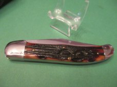 Queen 2008 Amber Craved Stag Bone Folding Hunter Pattern # 44 Queen 2008 Amber Craved Stag Bone Folding Hunter Pattern # 44