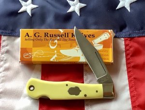 A G Russell 2004 Model. Mountain Man Knife w/ Yellow Derlin Handles  - NOS in Orig Box