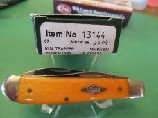 Case XX 2009 Smooth Persimmon Orange Bone Mini Trapper Wharncliff Pattern # 6207W SS Case XX 2009 Smooth Persimmon Orange Bone Mini Trapper Wharncliff Pattern # 6207W SS