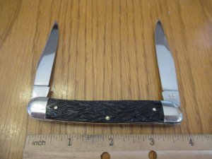Kissing Crane Rough Black Handles Muskrat 