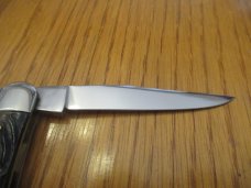 Kissing Crane Rough Black Handles Muskrat 
