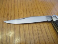 Kissing Crane Rough Black Handles Muskrat 