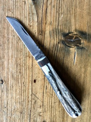 A. Wright & Son Sheffield England, Large Lambsfoot w/Stag Scales and Filed Work Back Spring...