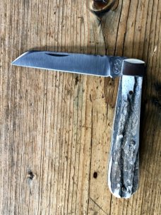 A. Wright & Son Sheffield England, Large Lambsfoot w/Stag Scales and Filed Work Back Spring...
