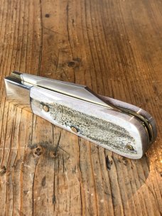 A Wright & Son Sheffield Barlow pocket knife with Stag Scales, Clip Blade and Filed Back Spring A Wright & Son Sheffield Barlow pocket knife with Stag Scales, Clip Blade and Filed Back Spring