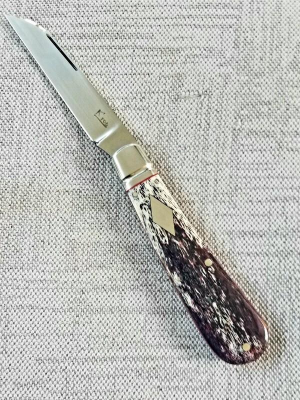 Kroo Burgundy Kudu Bone Lambsfoot,4" closed, Rwl34,white liners & spacers diamond shield.fileworked Kroo Burgundy Kudu Bone Lambsfoot,4" closed, Rwl34,white liners & spacers diamond shield.fileworked