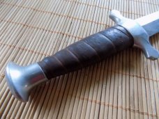 Dagger leather wrapped handle. knife