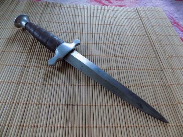 Dagger leather wrapped handle. knife