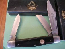 Puma  5 for One Money 4 Stockman's & 1 Trapper