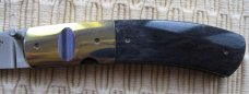 STAN FUJISAKA - GOLD & PURPLE GENTLEMAN'S LINER LOCK FOLDER STAN FUJISAKA - GOLD & PURPLE GENTLEMAN'S LINER LOCK FOLDER