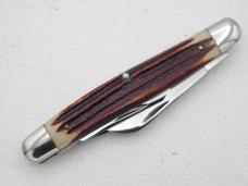 Queen Cutlery #9 Serpentine Stockman Burnt Orange imitation Winterbottom bone: 4” closed, circa 196 Queen Cutlery #9 Serpentine Stockman Burnt Orange imitation Winterbottom bone: 4” closed, circa 196