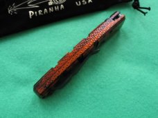 PIRANHA VIRUS / ORANGE & BLACK BLADE - NIB PIRANHA VIRUS / ORANGE & BLACK BLADE - NIB