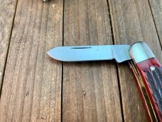 Russell Green River Works Stockman Red Pin Feather Jigged Bone Solingen Germany Russell Green River Works Stockman Red Pin Feather Jigged Bone Solingen Germany