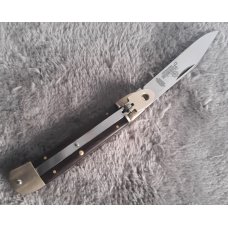 Vintage 1980's Hubertus Maroon Micarta clip point 7 1/4" Vintage 1980's Hubertus Maroon Micarta clip point 7 1/4"